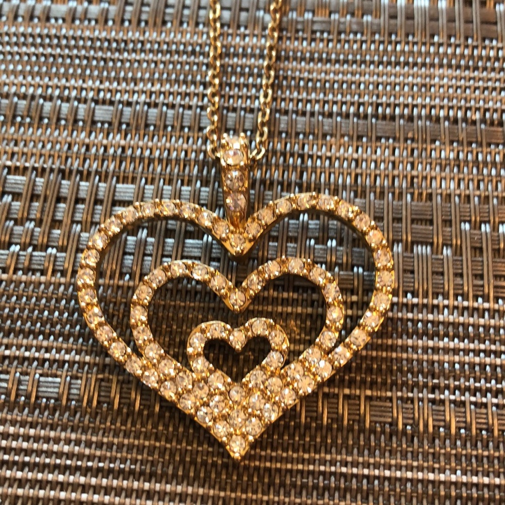 Nolan Miller goldtone hearts with crystals